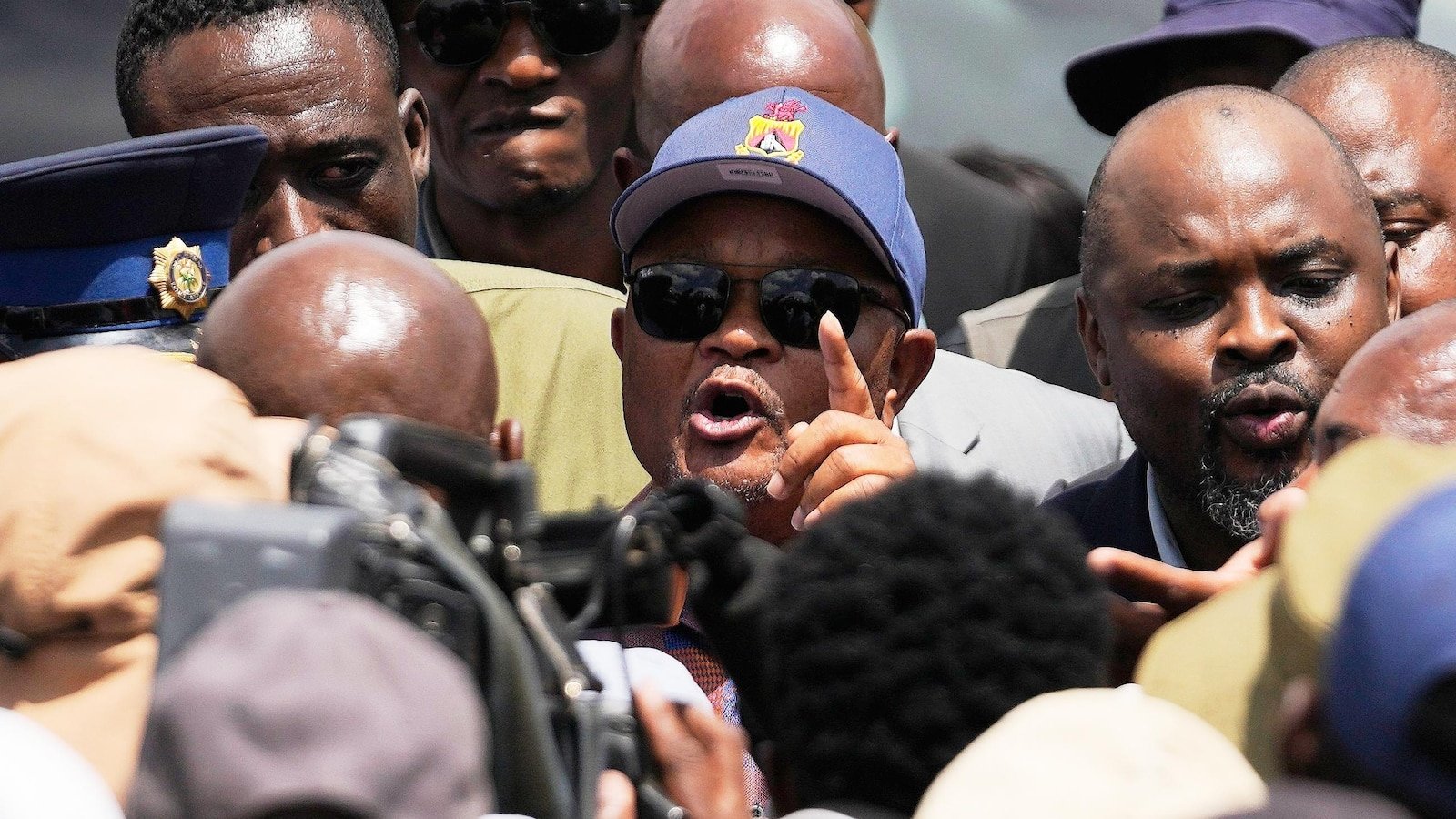 South African president suspends police minister and launches probe into alleged links to criminals