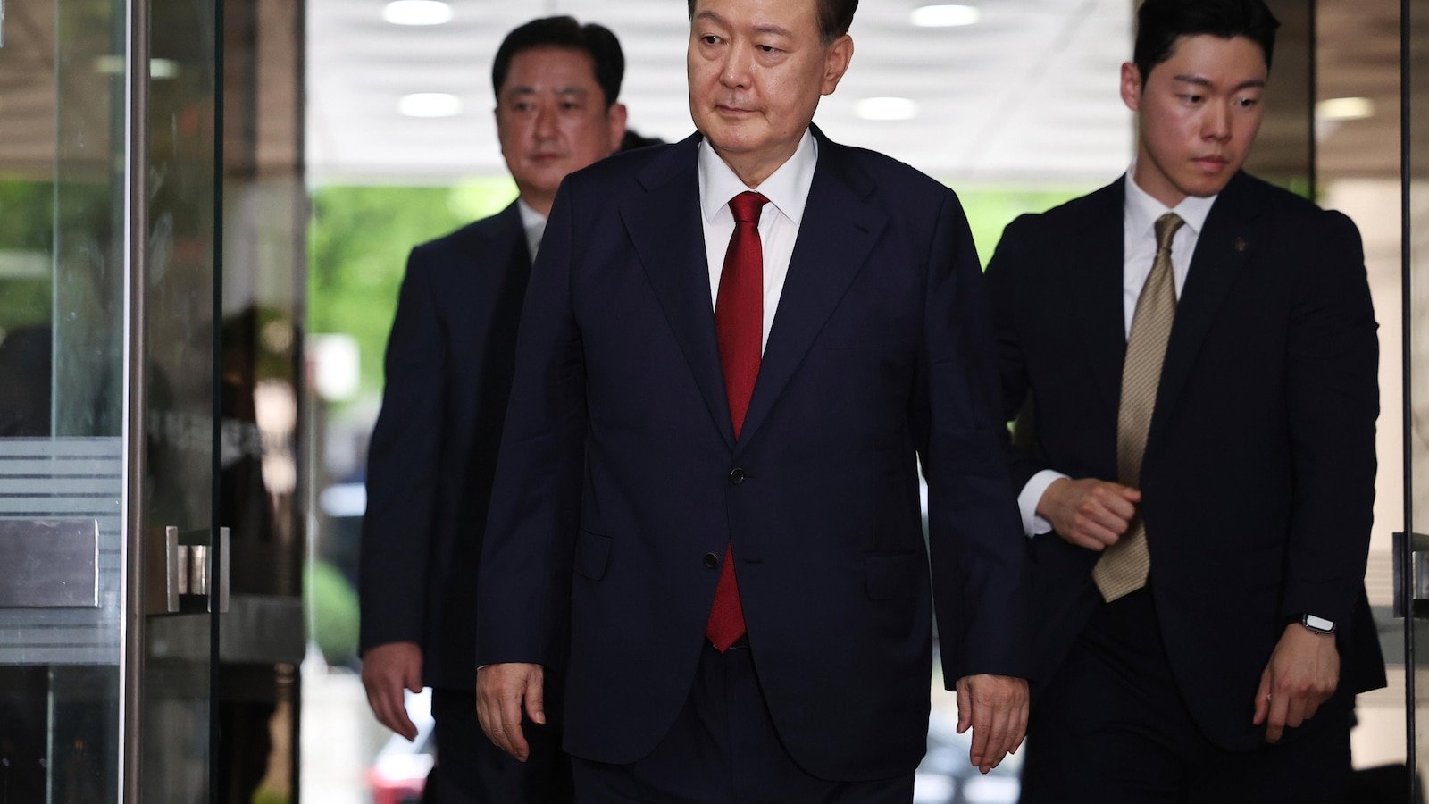 Ex-S. Korean leader appears in Seoul court for hearing on possible arrest warrant